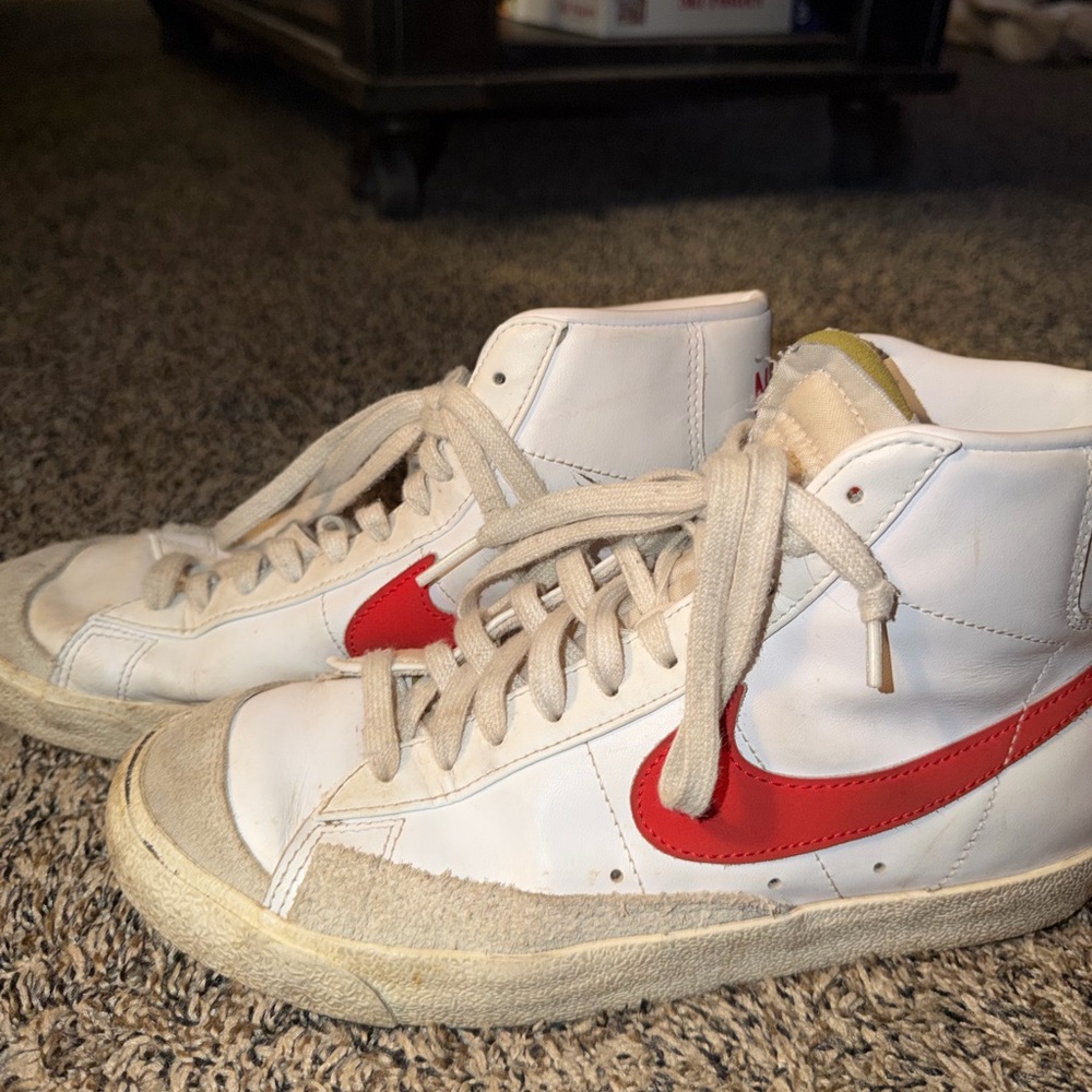 Nike White High-Top Sneakers with Red Swoosh